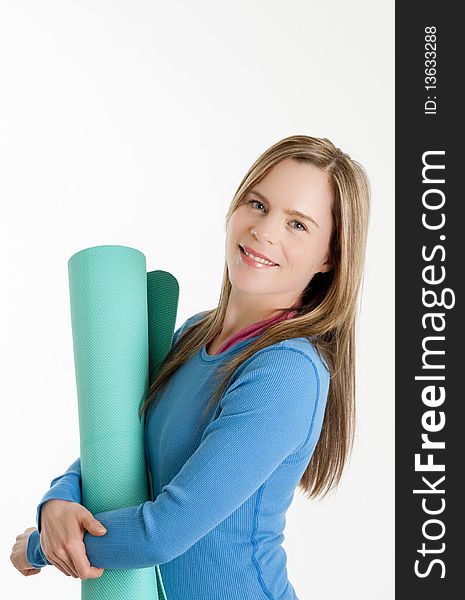 Young Woman With Execise Mat