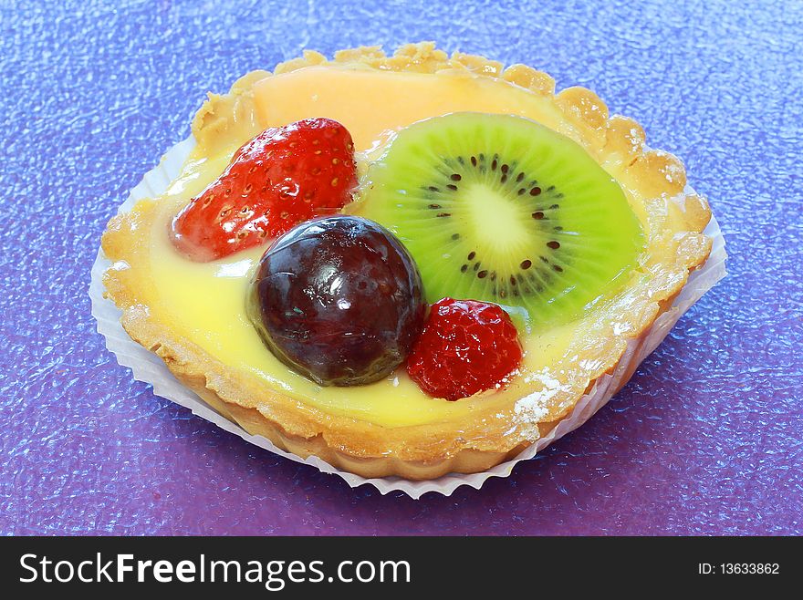 Little glazed fruit and custard tart. Little glazed fruit and custard tart