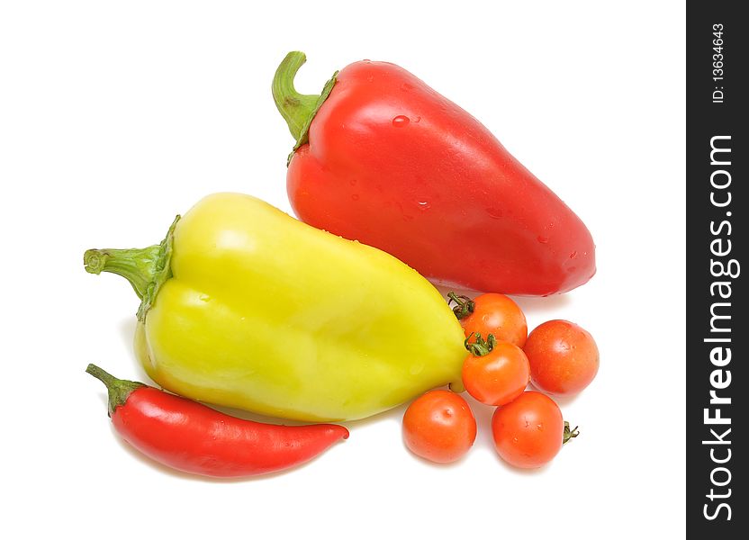 Red and yellow sweet paprika on white background