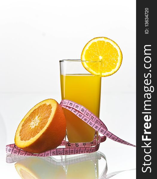 Orange juice for fitness with fruit on side