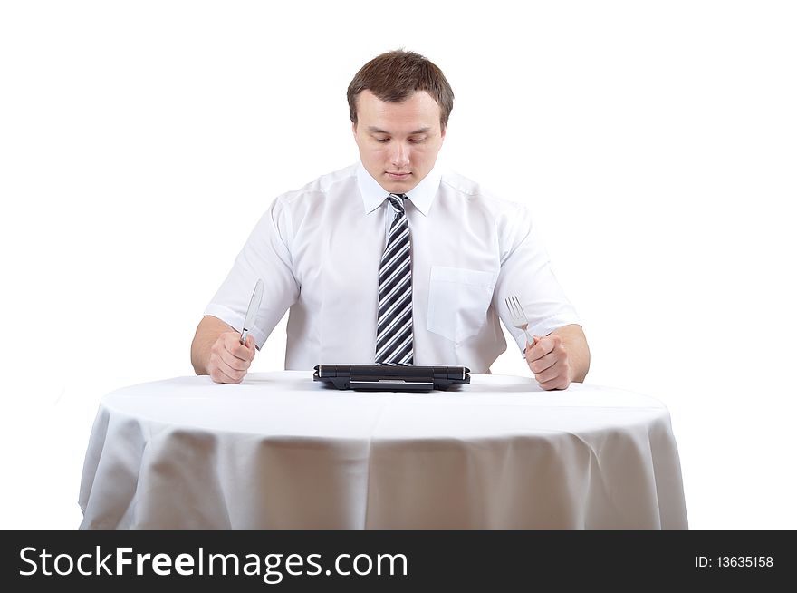 Businessman in suit is preparing to eat a notebook. Businessman in suit is preparing to eat a notebook