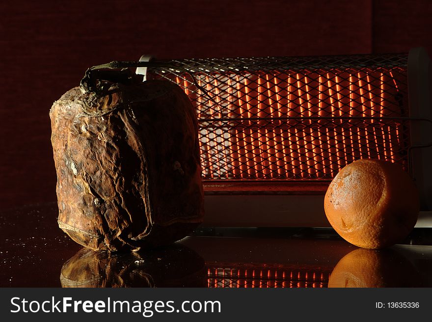 Here I made a composition with a rotten pumpkin and an orange which was rotten too.Here I used the natural light from the toater with some additional light source. Here I made a composition with a rotten pumpkin and an orange which was rotten too.Here I used the natural light from the toater with some additional light source