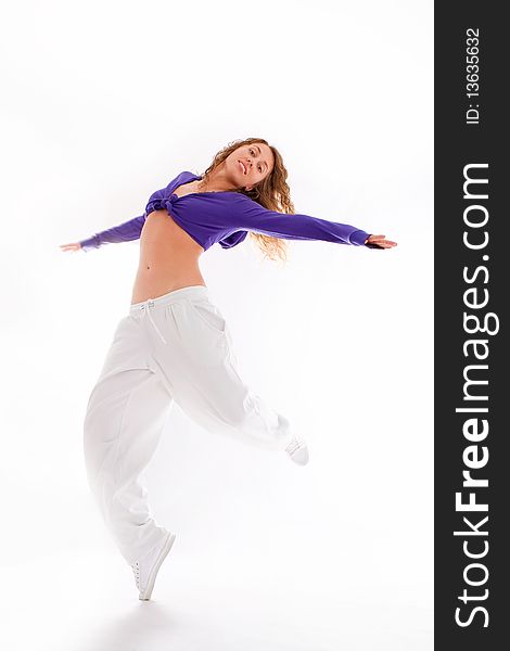Attractive girl dancing on a white background. Attractive girl dancing on a white background