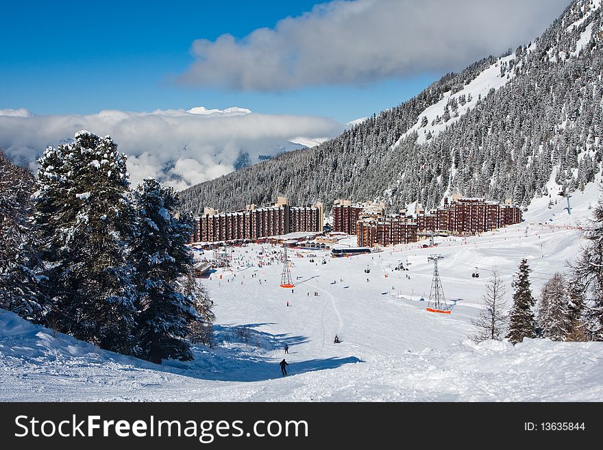 View on an alpine skiing resort. Winter sport vacation. View on an alpine skiing resort. Winter sport vacation