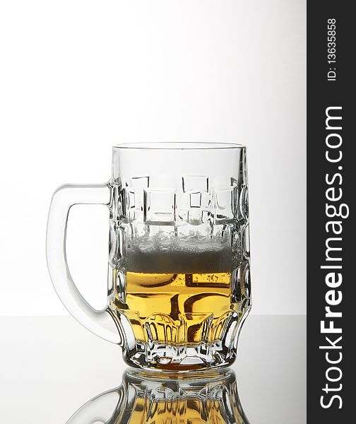 Pub mug on glass table