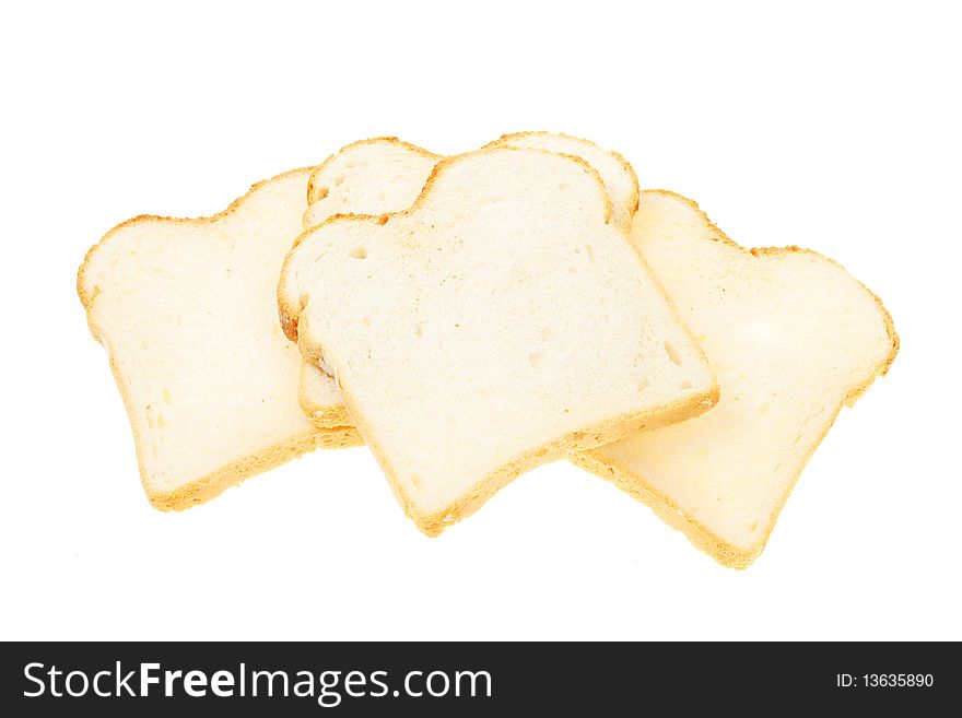 Slices of crusty white bread isolated on white. Slices of crusty white bread isolated on white