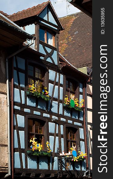 Traditional timber frame and stucco house in Riquewihr, , Alsace, France. Traditional timber frame and stucco house in Riquewihr, , Alsace, France