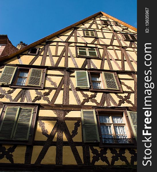 Traditional timber frame and stucco house in Riquewihr, , Alsace, France. Traditional timber frame and stucco house in Riquewihr, , Alsace, France