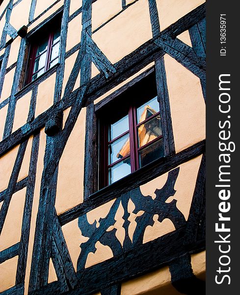 Traditional timber frame and stucco house in Riquewihr, , Alsace, France. Traditional timber frame and stucco house in Riquewihr, , Alsace, France