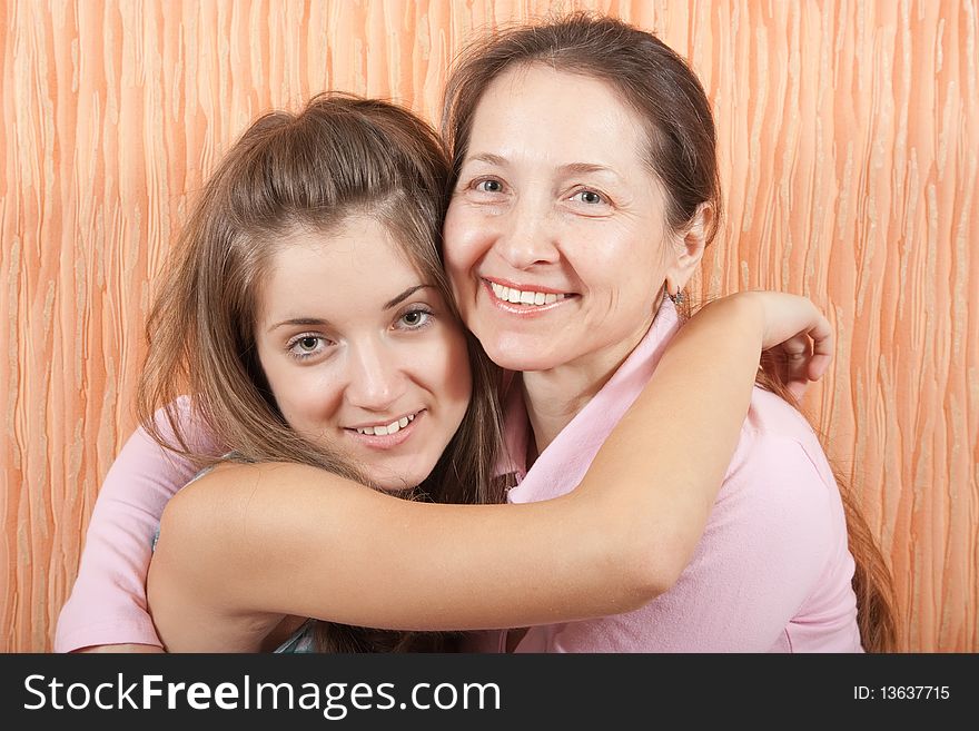 Lovely family couple. Mother and daughter indoor. Lovely family couple. Mother and daughter indoor