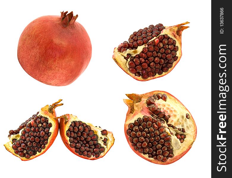 Set of pomegranates with grains on white