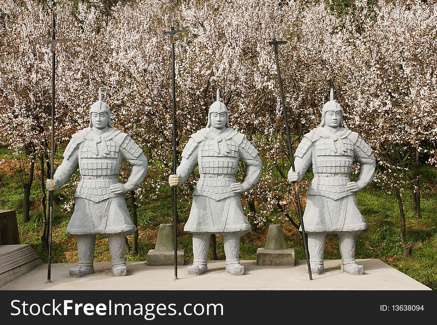 Chinese terra cotta warriors in the pear flower woods.