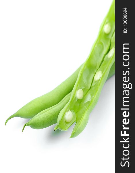 Pile of green french beans in isolated white background.