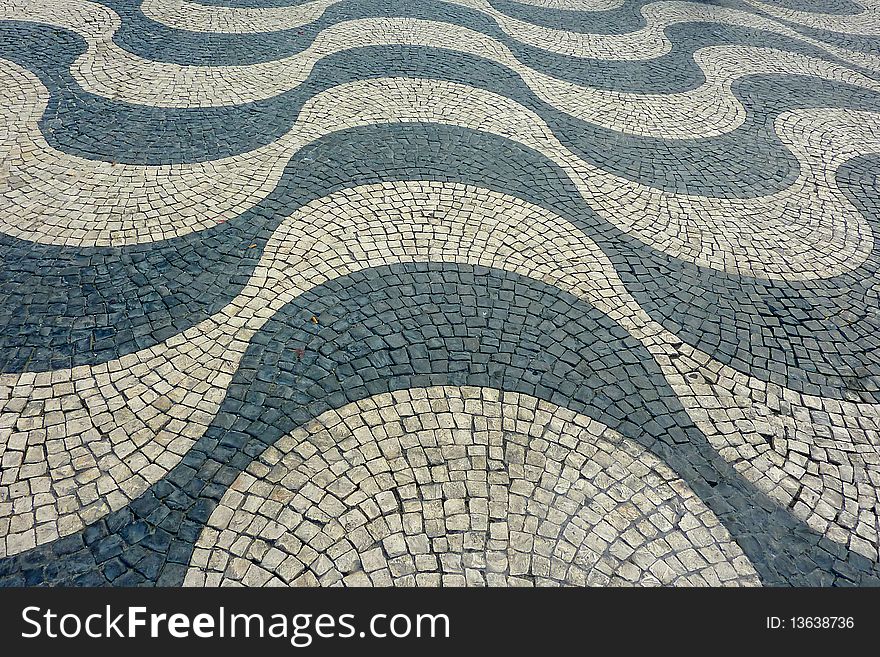 Tiled walkway in plaza in Lisbon, Portugal