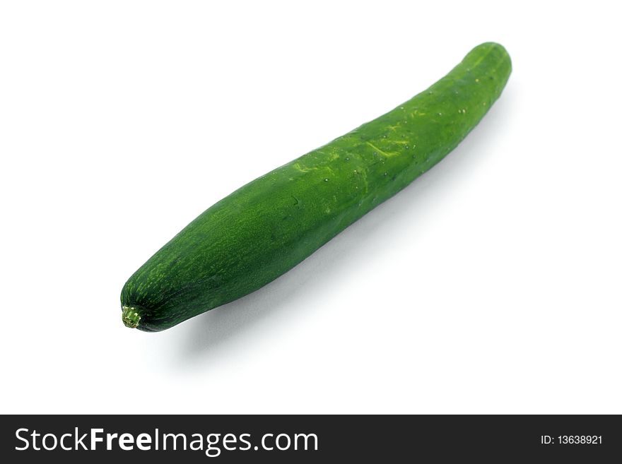 Close up of a cucumber isolated over white background.