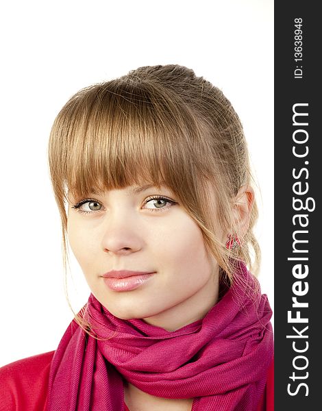 Young woman looking suspicious with a pink scarf. Young woman looking suspicious with a pink scarf