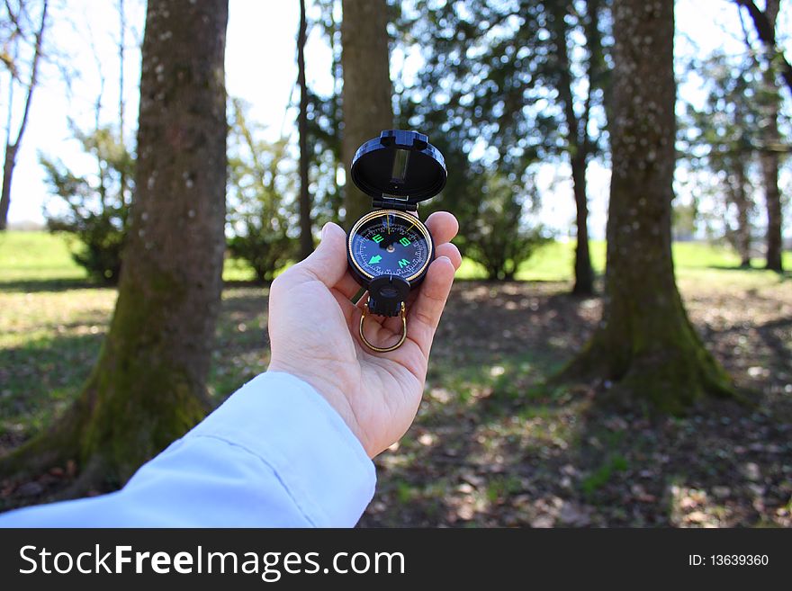 Businessman Holding A Compass Horizontal