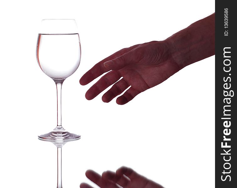 Hand and glass with water