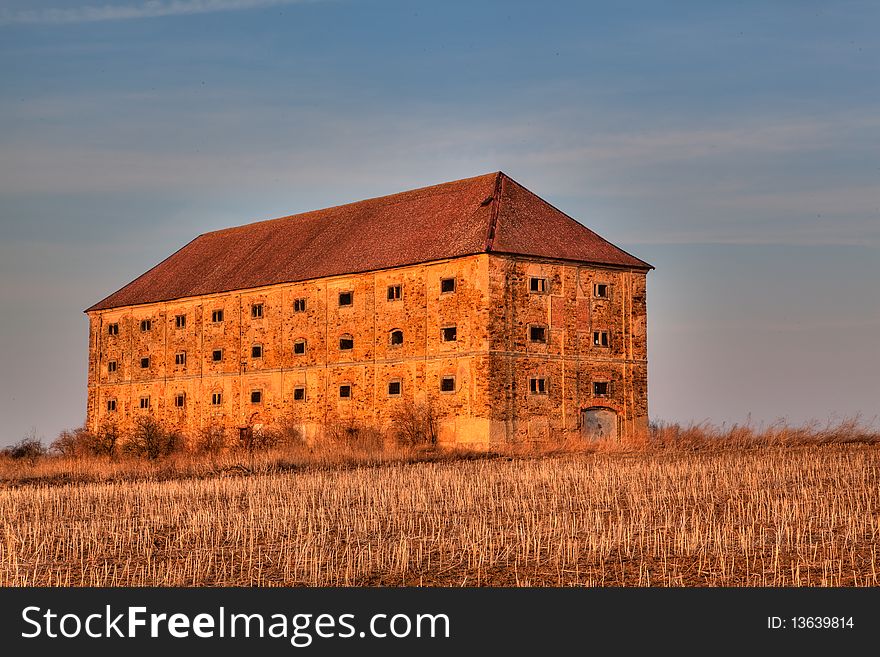 Old granary on the field