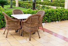 Brown Wooden Chairs An Tables On Patio Royalty Free Stock Photos