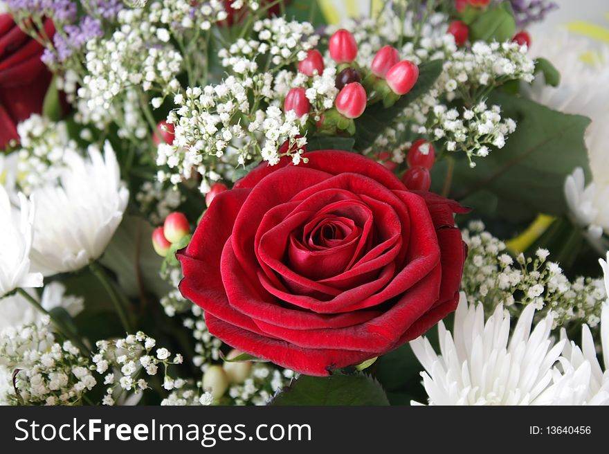 Fragment floral bouquet with a rose and chrysanthemum