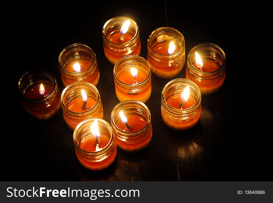 Lit Candles in room without lights