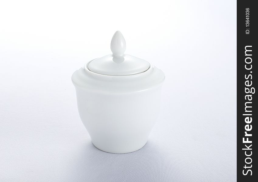 White sugar container on white