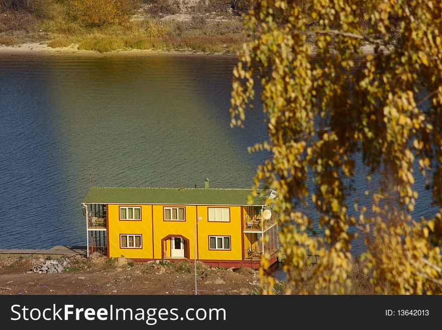 Boat station on the autumn river