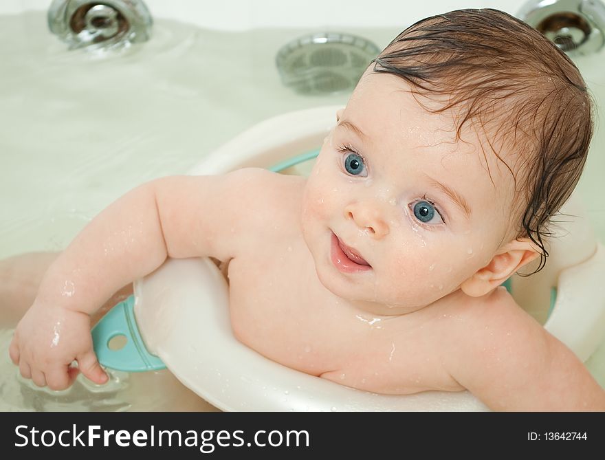 baby boy taking a bath