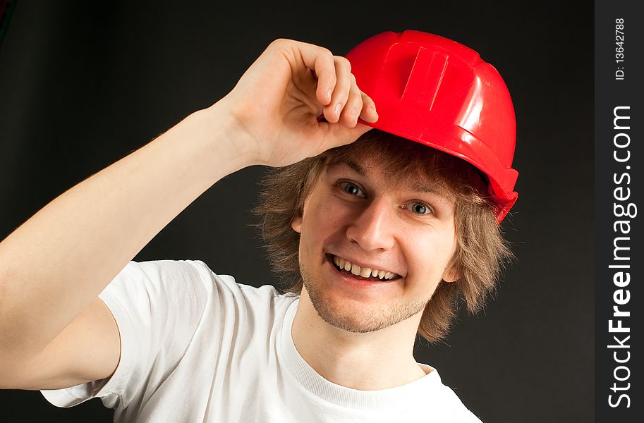 Smiling Young Man In A Hard Hat