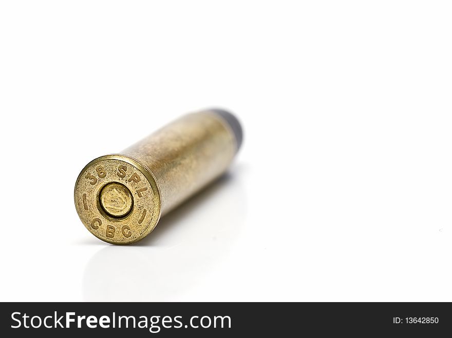 One bullet isolated on a white background. One bullet isolated on a white background.