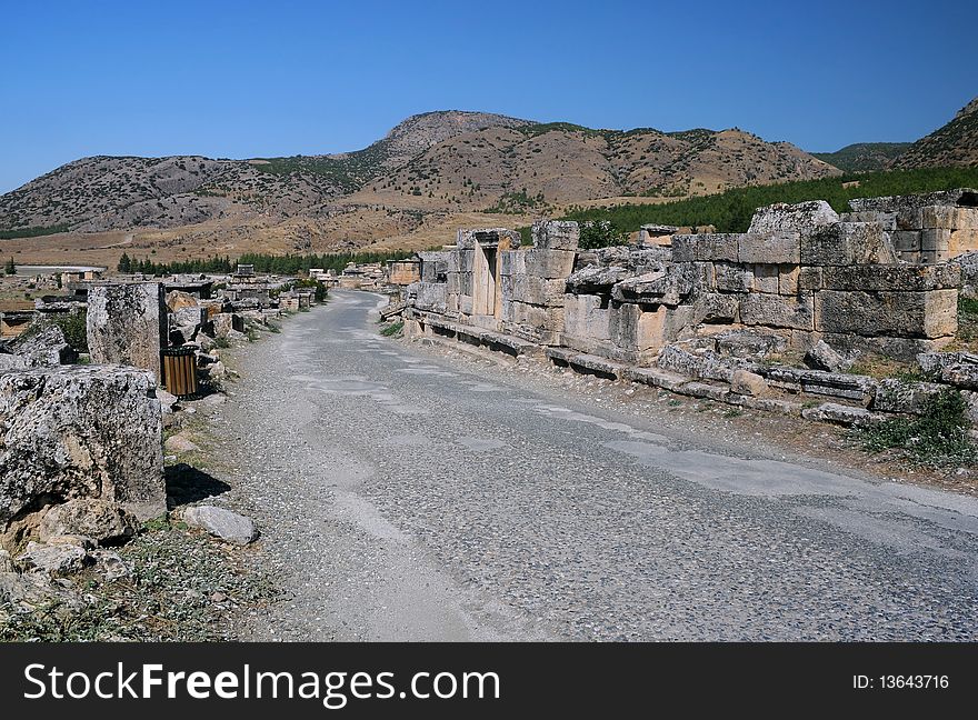 Empty street in ancient city of Hierapolis in Asia Minor inTurkey. Empty street in ancient city of Hierapolis in Asia Minor inTurkey.