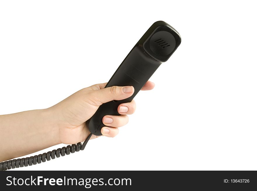 Handset in hand on a white background