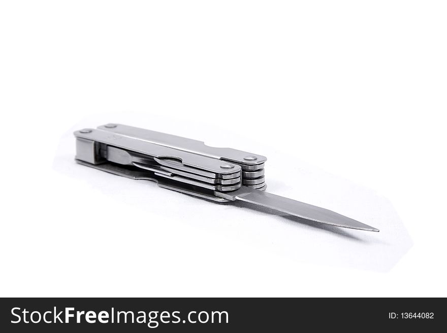 A locking knife / multi-tool isolated on a white background.
