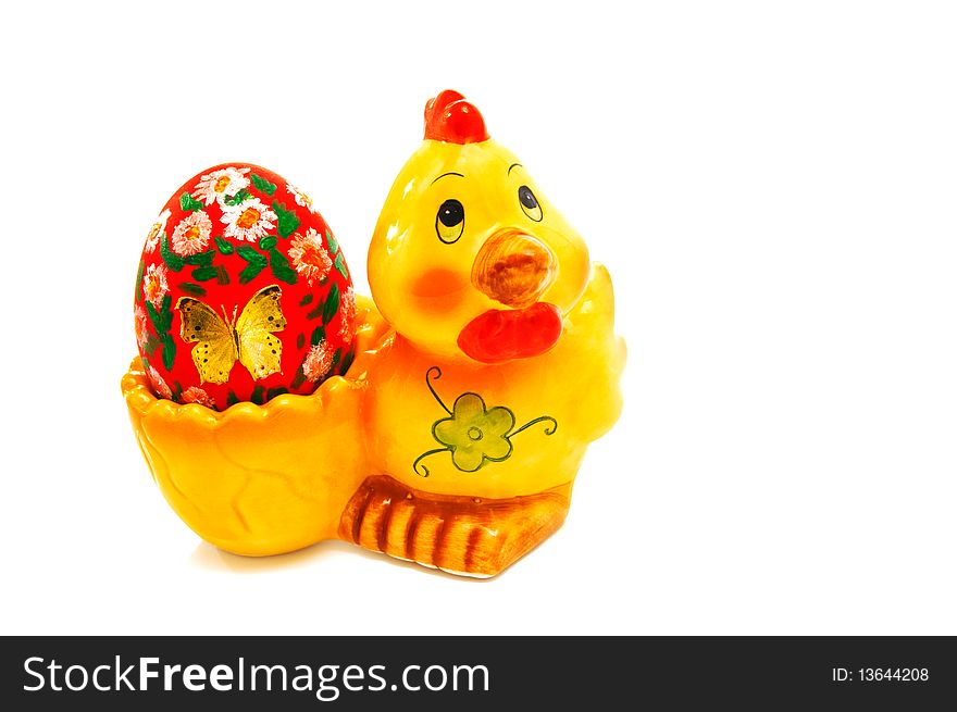 Easter egg on a funny support-yellow chicken. Easter egg on a funny support-yellow chicken.