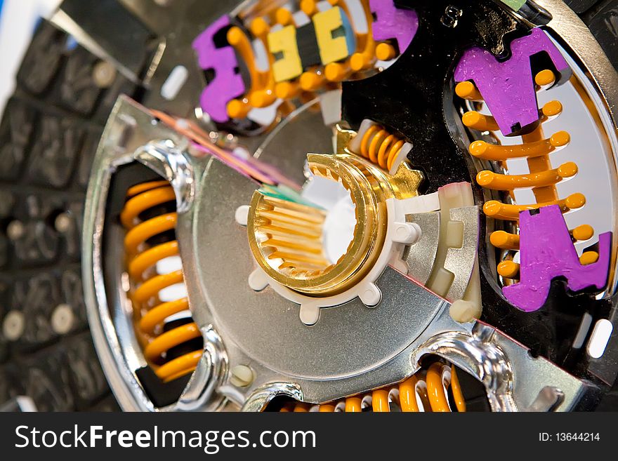 Metall disk of a car clutch with color details