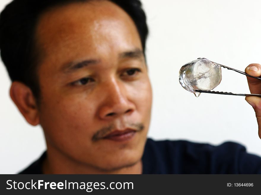 Man checking  ice water clean