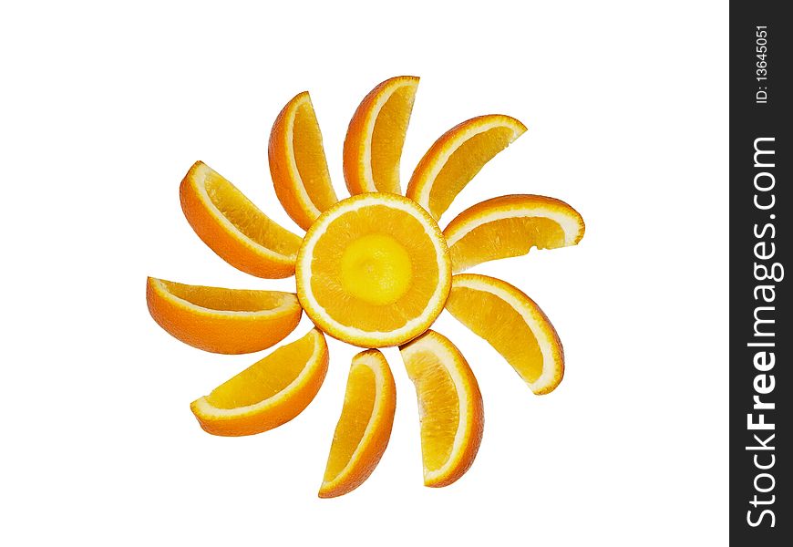 Segments of an orange and half of orange on a white background close up