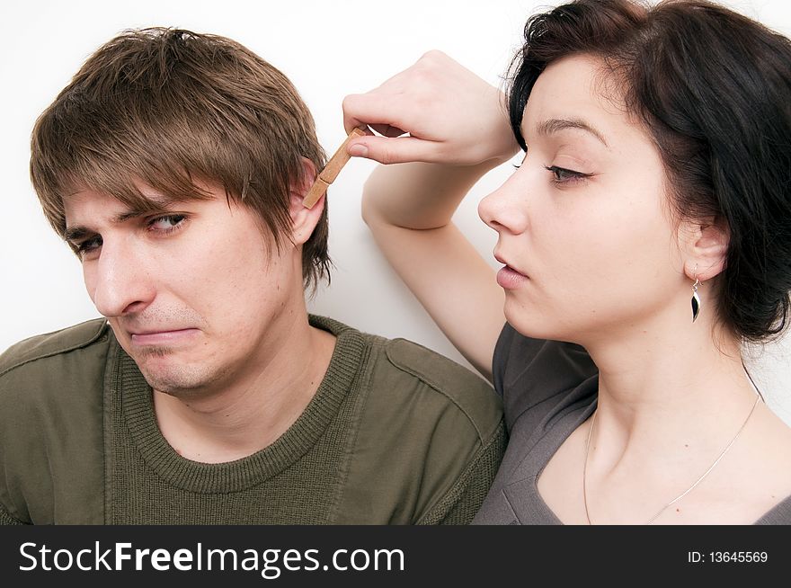 Young Couple Scene, she clip his ear with a clothes pin
