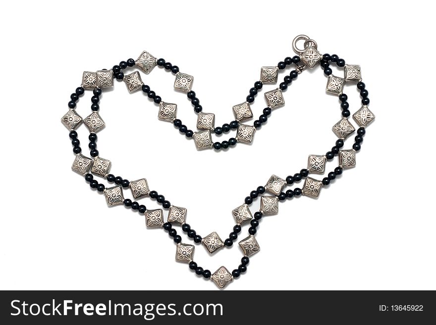 Chain  with jewels in shape of heart isolated on white. Chain  with jewels in shape of heart isolated on white