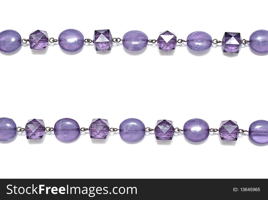 A chain with purple jewels isolated on white. A chain with purple jewels isolated on white