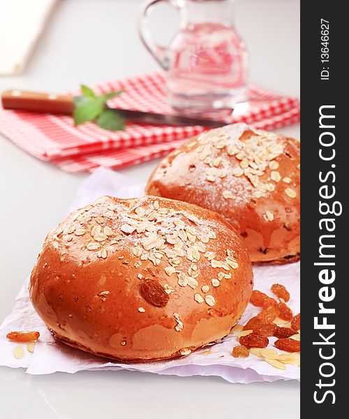 Sweet bread topped with rolled oats - closeup