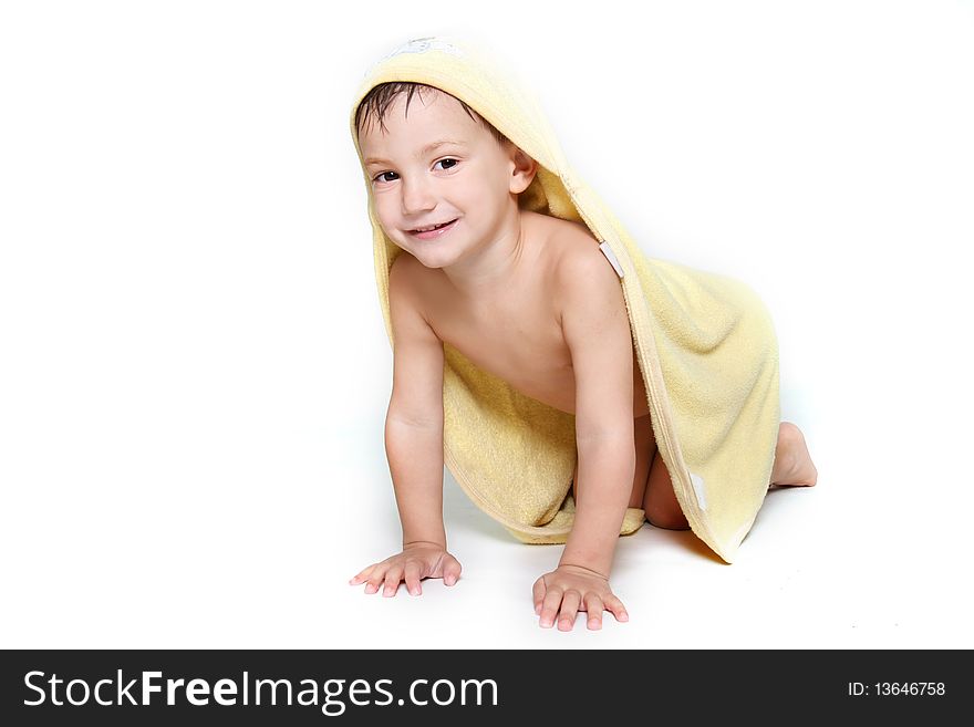 Cute boy in towel after bath