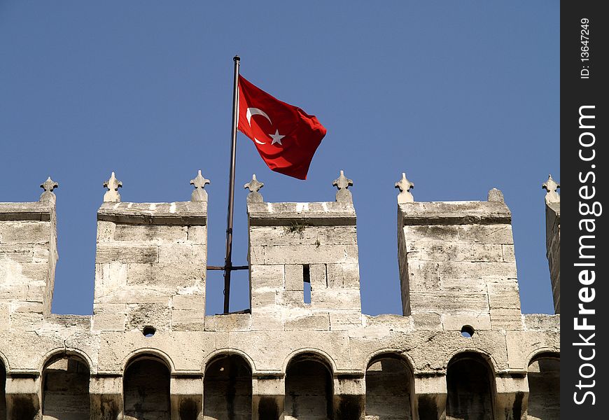 Turkish flag above entrance to Topkapi Palace Istanbul. Turkish flag above entrance to Topkapi Palace Istanbul