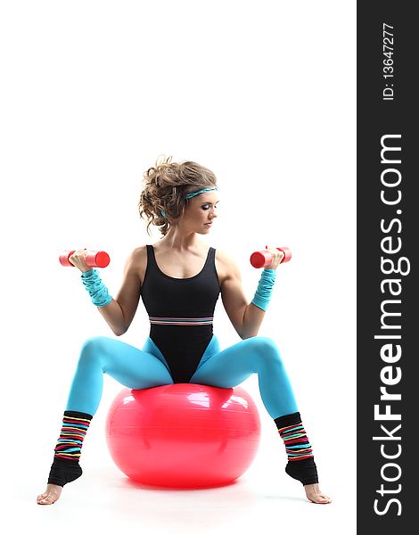 Sexy female doing aerobic exercises in sports clothing. Sexy female doing aerobic exercises in sports clothing