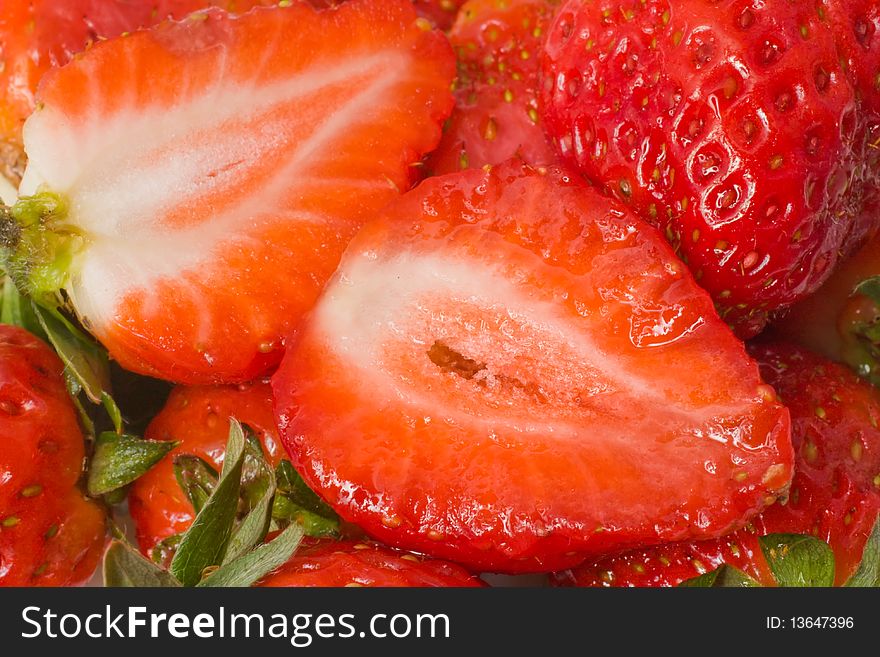 Group sliced fresh strawberries closeup. Group sliced fresh strawberries closeup