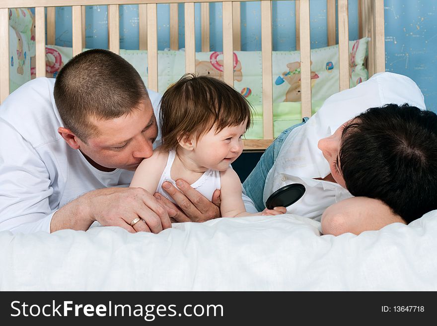 Family Home - Father, Mother And Little Daughter