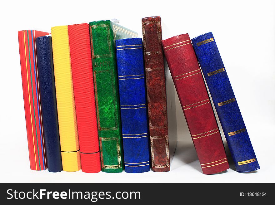 Pile of books in closeup  on white background