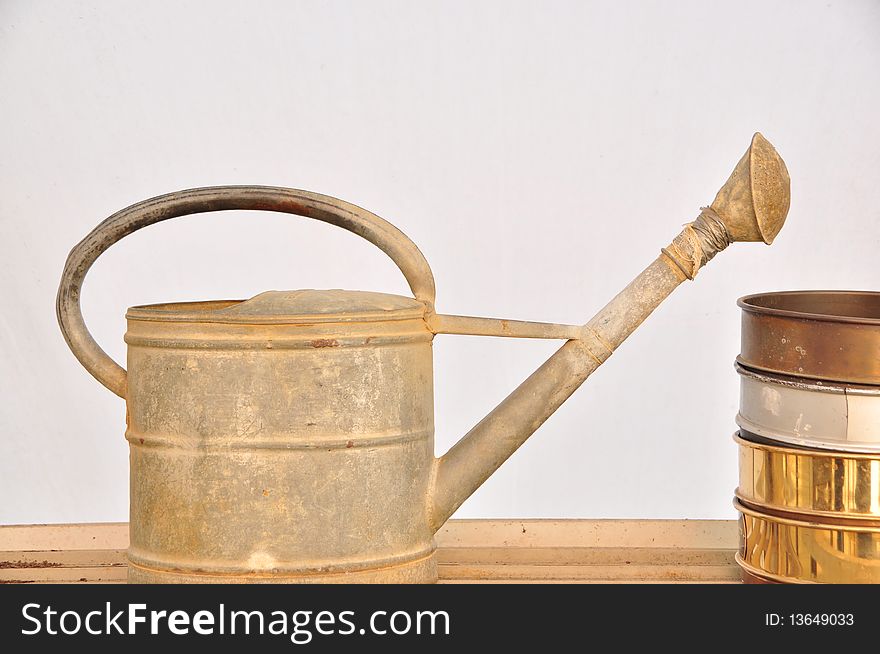 An old metal watering can