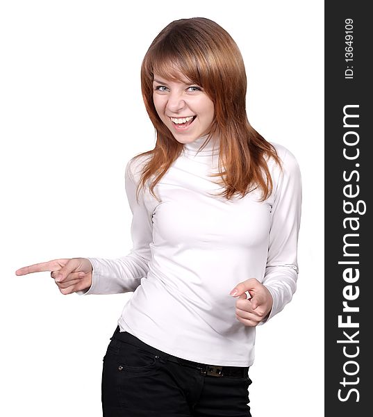 Smiling redhair girl pointing away isolated over white background. Smiling redhair girl pointing away isolated over white background